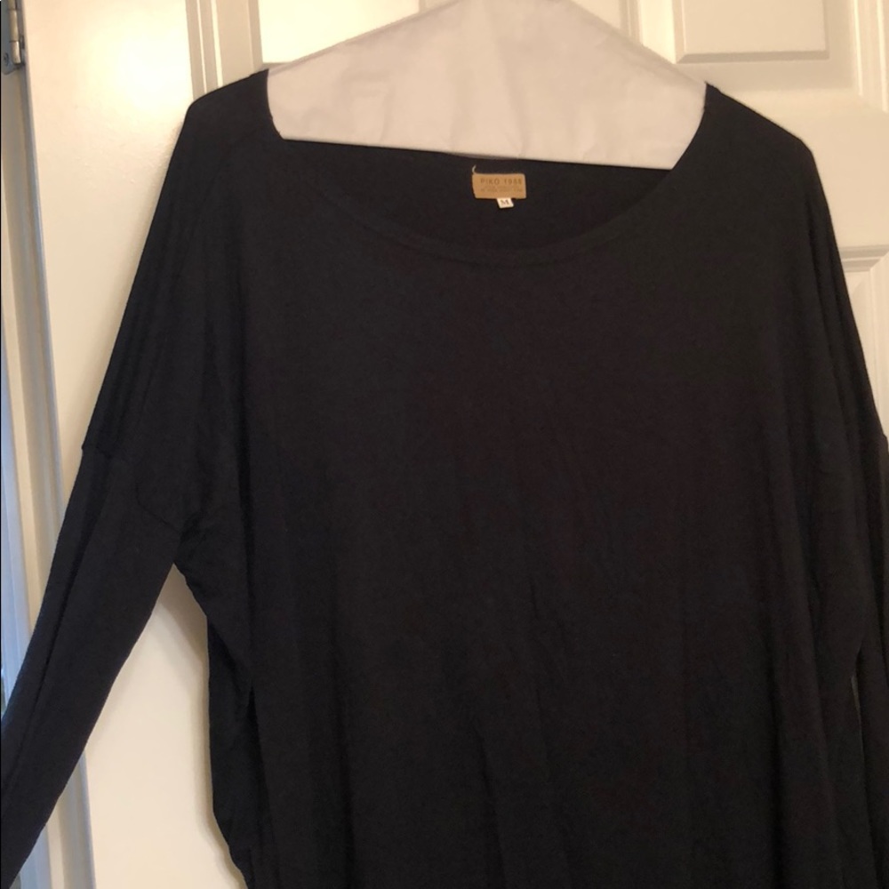 Black long sleeve piko top. Size medium